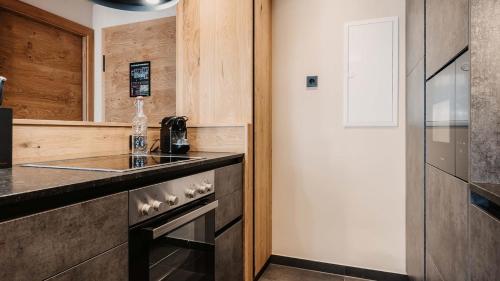 Dapur atau dapur kecil di Hofgut Apartment & Lifestyle Resort Wagrain