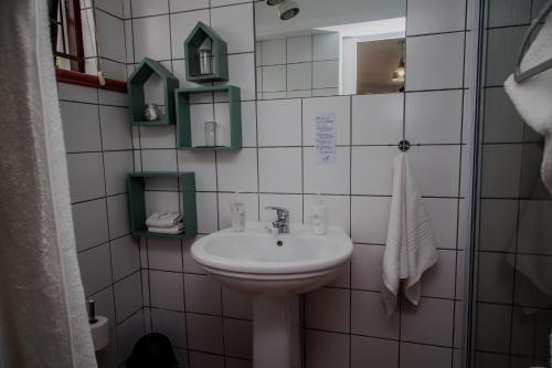 Ванная комната в Aan de Oever Guesthouse