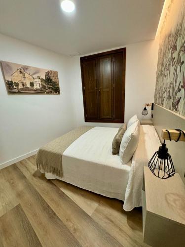 Ένα ή περισσότερα κρεβάτια σε δωμάτιο στο Solera Suites