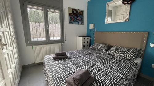 Postel nebo postele na pokoji v ubytování La casita