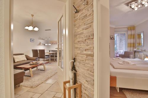 Ένα ή περισσότερα κρεβάτια σε δωμάτιο στο Residenz Ostseestrand Appartement 6