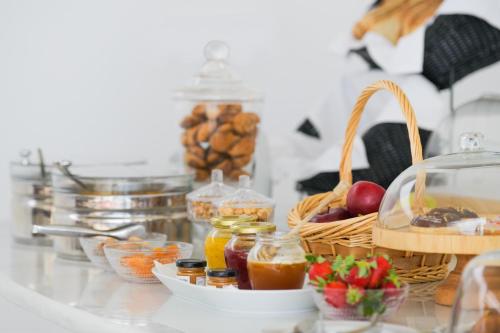 a counter top with a bunch of food on it at Kallisti Paros in Naousa