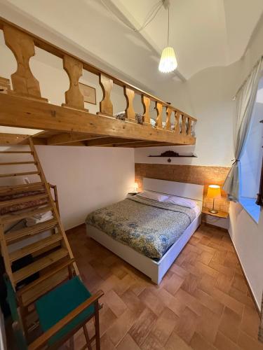 Postel nebo postele na pokoji v ubytování Nel Bel Mezzo di Pisa