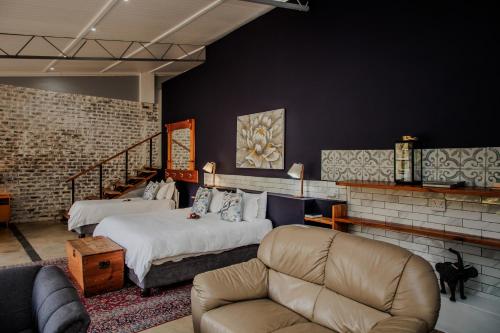 Кровать или кровати в номере Aan de Oever Guesthouse