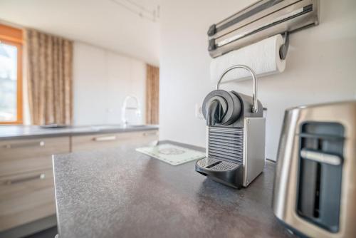 Η κουζίνα ή μικρή κουζίνα στο La Perle Isolée- L'Essentiel - Appartement de 100m2