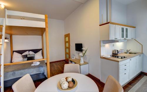 Kuchyň nebo kuchyňský kout v ubytování Apartmány Třeboň BÍLÝ BERÁNEK