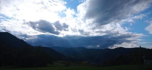 a cloudy sky with mountains in the background at Agriturismo IL CERRO in Marzabotto