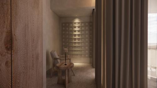 a room with a chair and a wine cellar at La Gaia - Adult Only in Alanya