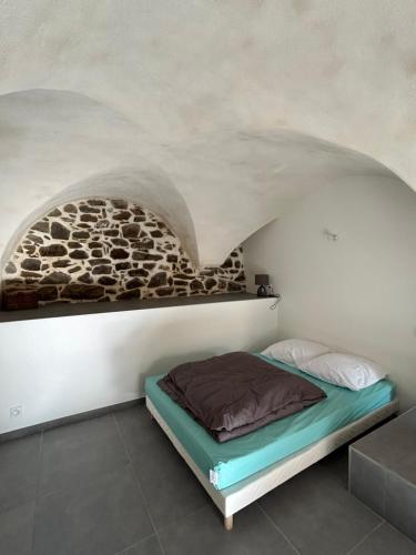 Ένα ή περισσότερα κρεβάτια σε δωμάτιο στο Risoul Village - Appartement 4 personnes - Le Languieu