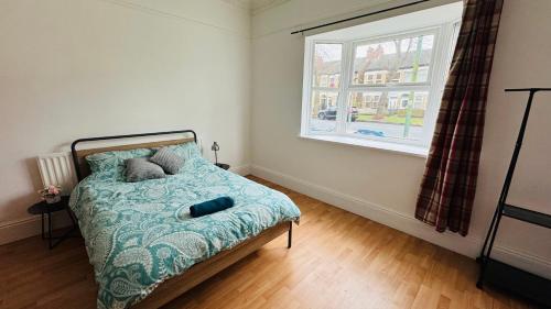 Ένα ή περισσότερα κρεβάτια σε δωμάτιο στο Boulevard double room in shared accommodation