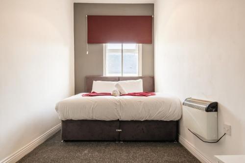 Postel nebo postele na pokoji v ubytování Deluxe Flat Near Tynemouth