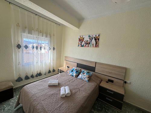Postel nebo postele na pokoji v ubytování Villa Maravilla Xeraco, Gandia, Valencia