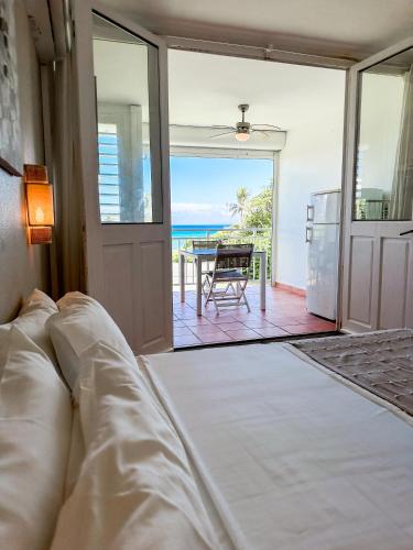 Llit o llits en una habitació de Anse des Rochers