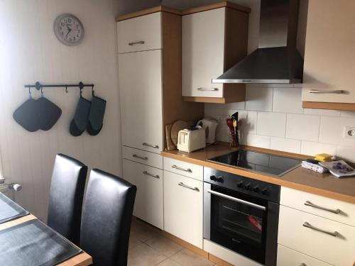 Kuchyň nebo kuchyňský kout v ubytování Freistehendes Ferienhaus Mit Garten