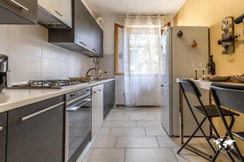 Cucina o angolo cottura di All'Ombra del Castello by Holiday World