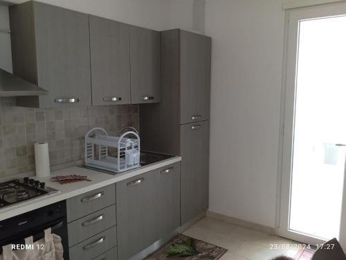 Kuchyň nebo kuchyňský kout v ubytování Casa mare Torre Pali Salento