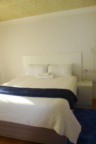 เตียงในห้องที่ Bara Guesthouse