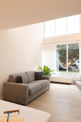 Гостиная зона в Blue - x4PAX Private Garden in Lugano