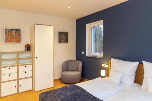 Letto o letti in una camera di Ferienwohnungen Friedenshöhe in Oberammergau