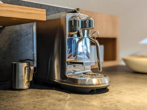 Set per la preparazione di tè e caffè presso Ferienwohnungen Friedenshöhe in Oberammergau