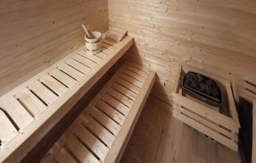 an inside view of a sauna with wooden floors and ceilings at Gorgeous Home In Kowalewo With Wifi in Kowalewo