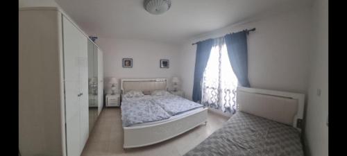 Ένα ή περισσότερα κρεβάτια σε δωμάτιο στο Dream Apartment