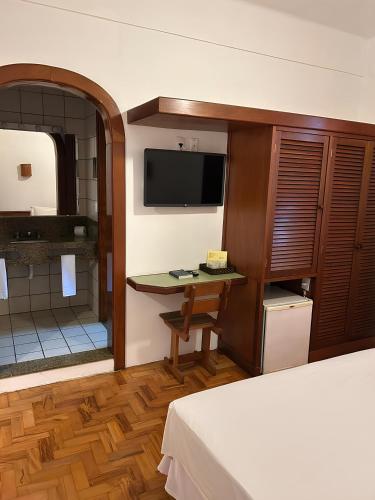 TV a/nebo společenská místnost v ubytování VOA Hotel União