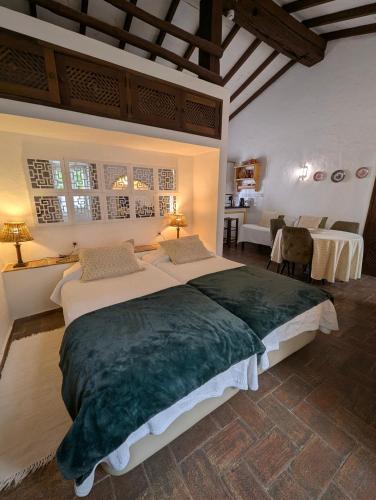 Posteľ alebo postele v izbe v ubytovaní Quinta do Caracol