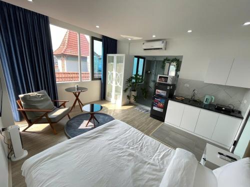 Ein Bett oder Betten in einem Zimmer der Unterkunft CHARM CHARM - kimmy housing - 48 To Ngoc Van