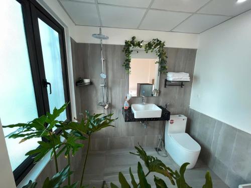 Ein Bett oder Betten in einem Zimmer der Unterkunft CHARM CHARM - kimmy housing - 48 To Ngoc Van