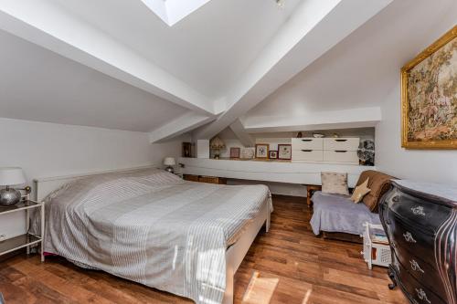Ένα ή περισσότερα κρεβάτια σε δωμάτιο στο Appartement de maitre traversant