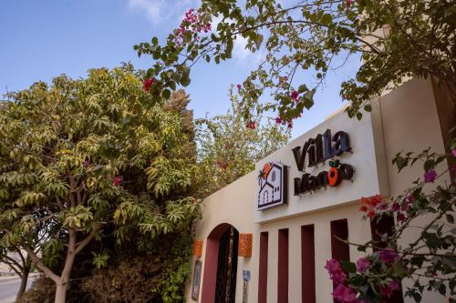 a pizza hut building with a sign on it at Villa Mango Hotel, near the American University in Cairo, AUC, New Cairo in Cairo