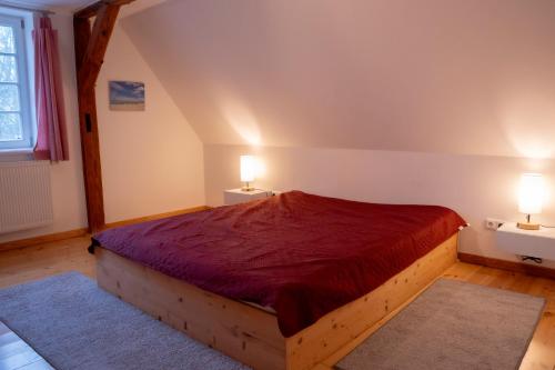 Katil atau katil-katil dalam bilik di Ferienwohnung Techin am Schaalsee