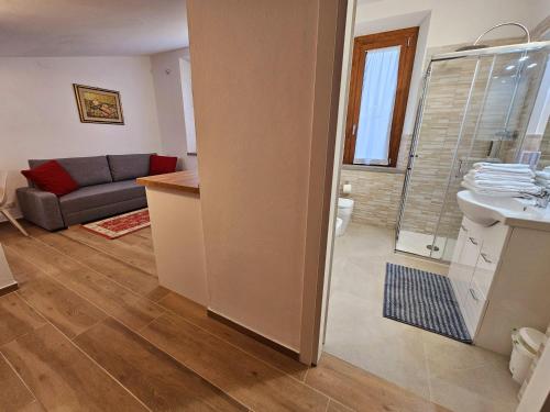 a bathroom with a sink and a shower in a room at Residenza Albalonga in Castelnuovo Berardenga