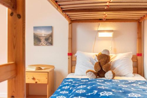 Ένα ή περισσότερα κρεβάτια σε δωμάτιο στο Ferienhaus Lora - Haffkrug