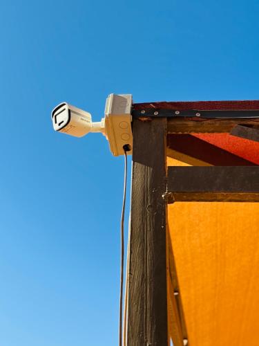 a close up of a electricity meter on a pole at Rum Goldeneye luxury camp in Wadi Rum