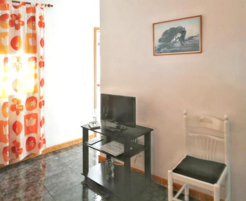 Televízia a/alebo spoločenská miestnosť v ubytovaní Modern apartment in Frontera, 45 m² with sea view balcony