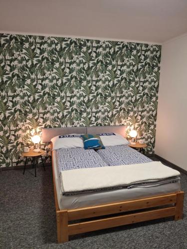 Posteľ alebo postele v izbe v ubytovaní Apartament LORD