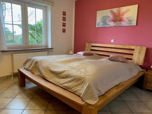 Ένα ή περισσότερα κρεβάτια σε δωμάτιο στο Ferienhaus Immerlicht Norddeich S-H