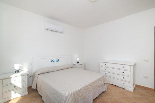 Postel nebo postele na pokoji v ubytování Mirti 1