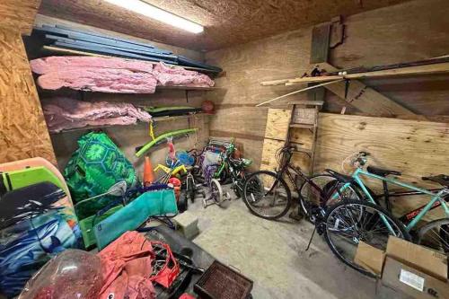 a group of bikes parked in a garage at Beautiful beach and bayfront house in North Topsail Beach