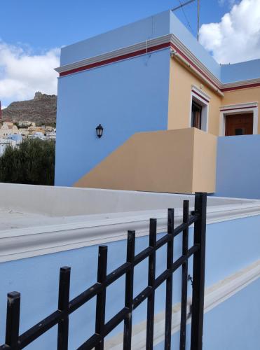a view from the balcony of a house at Anemi Leros Apartments 2 in Panteli