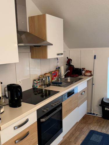 Kuchyň nebo kuchyňský kout v ubytování Schöne Oberwohnung in Oldenburg Osternburg