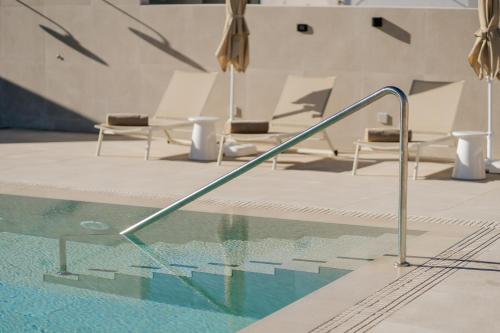 Πισίνα στο ή κοντά στο Hotel Reveron Plaza