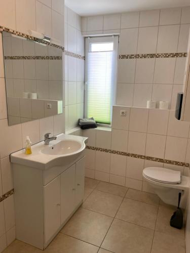 Koupelna v ubytování Ferienwohnung Funke D6 für Monteure