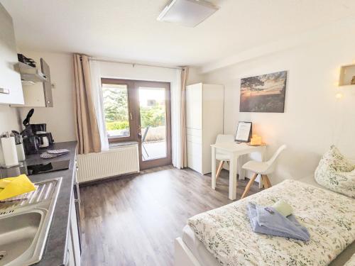 Kuchyň nebo kuchyňský kout v ubytování B1 - Urlaubsmagie - Einzimmerwohnung direkt am Wanderweg