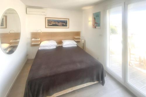 Posteľ alebo postele v izbe v ubytovaní Maison chaleureuse au cœur des Calanques de Marseille + jardin.