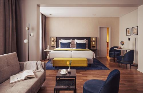 Una cama o camas en una habitación de Hotel Mannheimer Hof - Leonardo Limited Edition