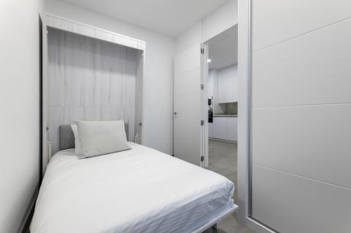Ένα ή περισσότερα κρεβάτια σε δωμάτιο στο Casahost Casa Air