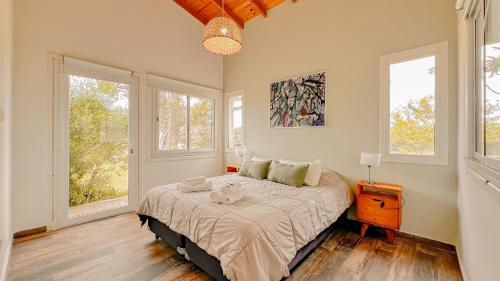 Ένα ή περισσότερα κρεβάτια σε δωμάτιο στο Casa Luca - Casa En Barrio Privado San Benito, Chapadmalal Para 6 PAX Con Pileta - Hola Sur